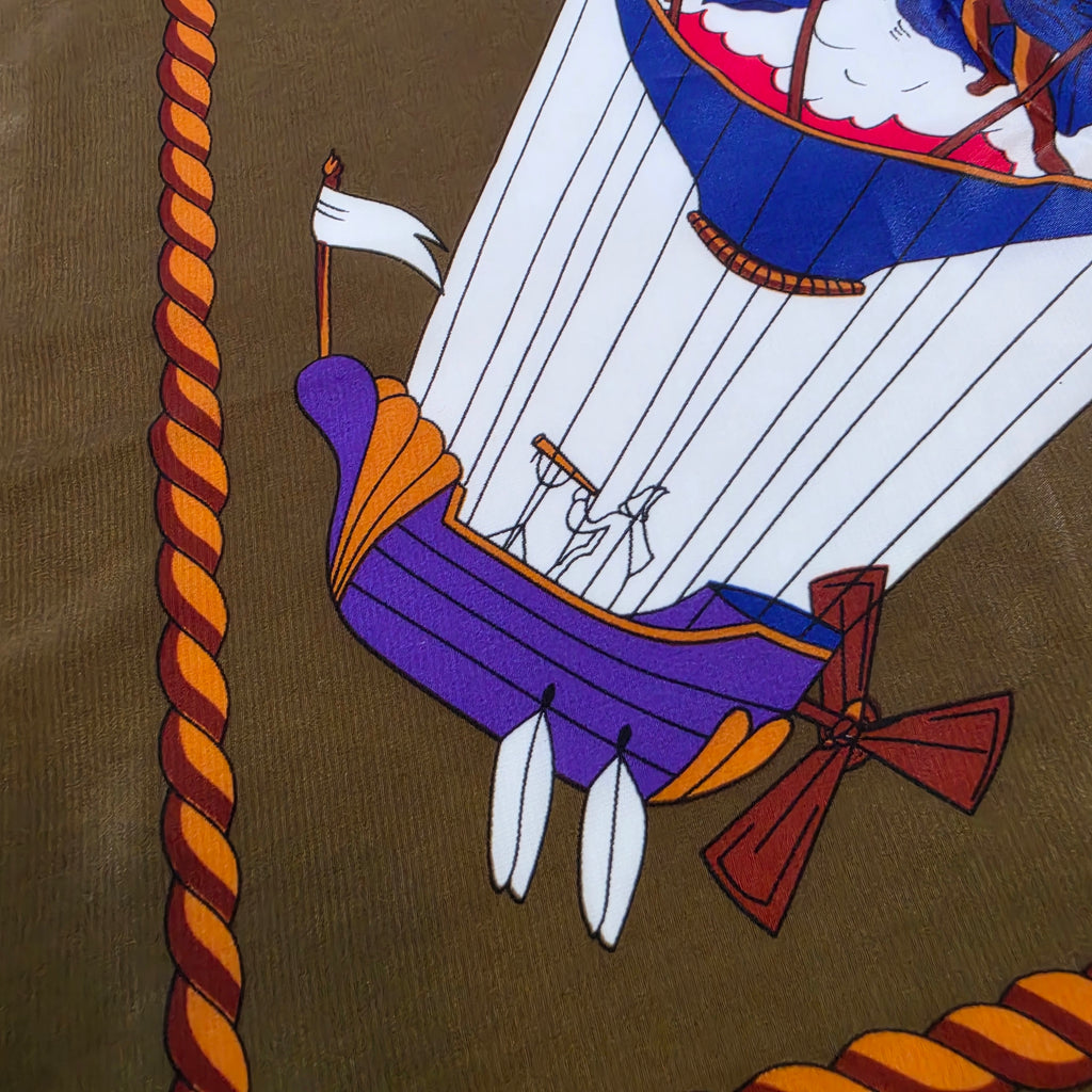 Hermès “Les Montgolfières” Silk Scarf – Olive Green – 90cm Carré – Mint Condition